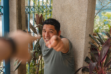 Middle-aged man emotionally defending himself in a heated exchange. Man evading responsibility...