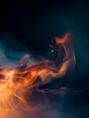 Fototapeta premium A detailed view of a fire blazing intensely against a dark black backdrop, showcasing the fiery flames up close
