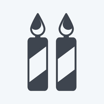 Two Candles Icon in trendy glyph style isolated on soft blue background