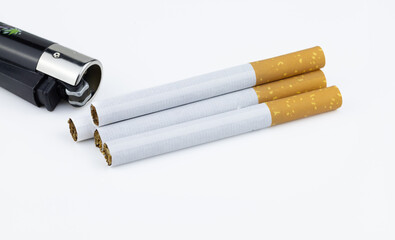 Lighter and Cigarettes on white background 