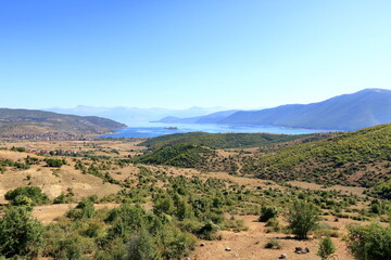 Fototapeta na wymiar Albania- Prespa National Park- Lake Prespa with Maligrad Island - Greece and Macedonia in the background