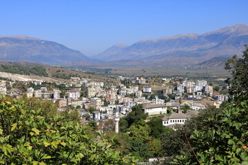 Fototapeta na wymiar amazing view over Gjirokastra and the valley of the Drino River and the surrounding mountains