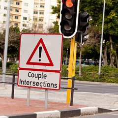 Road sign, caution and traffic light or intersection city for street safety or transportation...