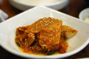 A type of kimchi, especially kimchi that is aged at low temperature for more than 6 months.