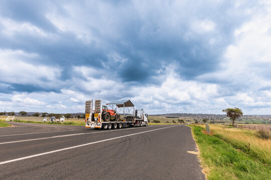 Semi trailer truck driving on cloudy day on the Golden Highway in the Hunter Region