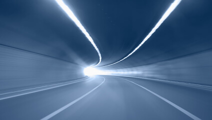 Abstract highway road tunnel with car light 