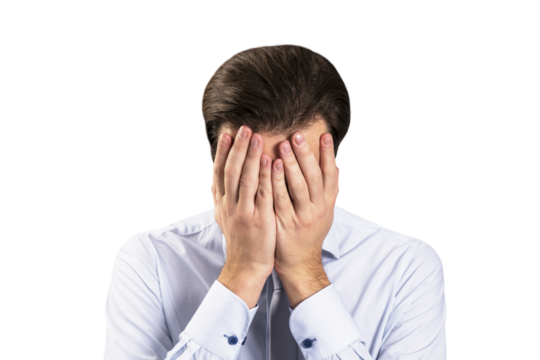 A young man in a shirt covering his face with hands, isolated on a white background, expressing emotion of stress or despair - Powered by Adobe