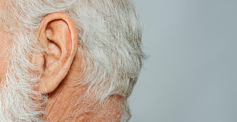 elderly man ear detail close-up macro - obrazy, fototapety, plakaty