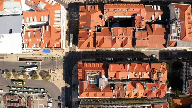 Aerial Top Downward Shot Of Roofed Buildings In Residential City On Sunny Day - Lisbon, Portugal