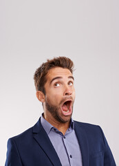 Studio, shock or businessman with announcement space on white background for style, offer or promo. Wow, entrepreneur or salesman in disbelief with breaking news, clothes deal or surprise mock up