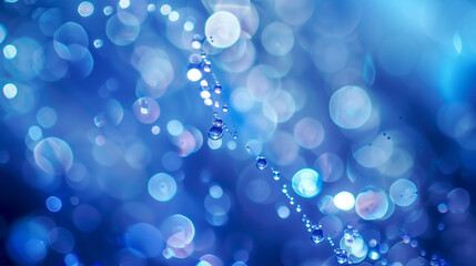 blue water drops, abstract blue background, blue glitter, shiny background with blurred bokeh
