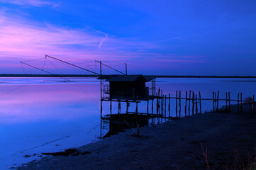 sunset at Pialassa Baiona near Marina Romean (Italy)