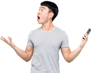 Astonished Asian man with mobile phone in hands looking up PNG file no background 