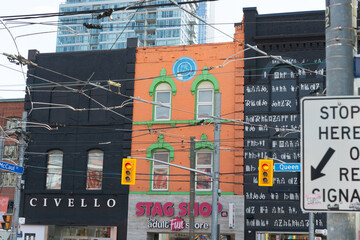Fototapeta premium three curious buildings (Civello, Stag Shop, and OD Toronto) located at 269 271, 273 Queen Street West