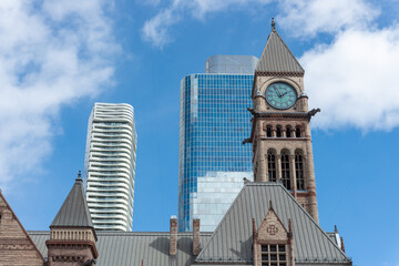 Fototapeta premium roofline and tower at Toronto Old City Hall, a historical landmark, located at 60 Queen Street West