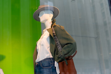 Fototapeta premium shallow depth of field focus with some blur of a mannequin with an Emporio Armani bag 