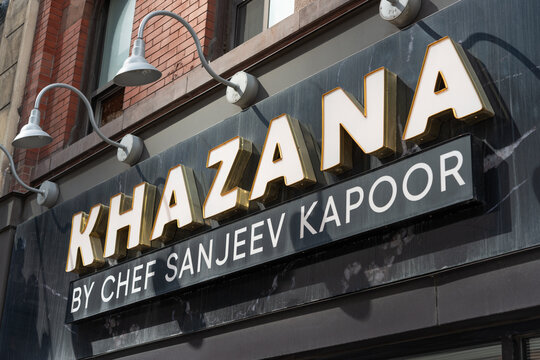 exterior building facade and sign of KHAZANA Toronto - by Chef Sanjeev Kapoor, an Indian restaurant, located at 261 Yonge Street