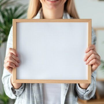 Woman Holding Blank Frame