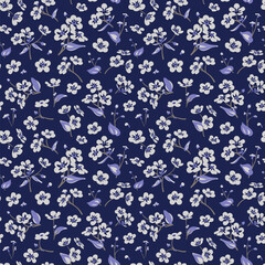 Seamless pattern with light flowers - Myosotis isolated on the dark-blue background. Hand-drawn illustrations of wildflowers. Forget-me-not flower.
