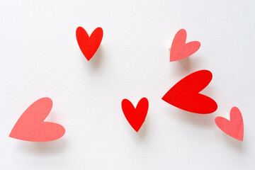 red hearts with 3d effect on paper