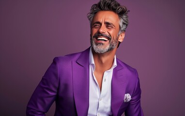 Fototapeta premium A man in a purple suit is smiling and laughing