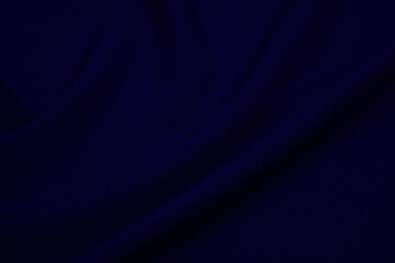 Texture of dark blue fabric closeup. Low key photo. Plexus threads. Clothing industry. Abstract background. Textile waves. - obrazy, fototapety, plakaty