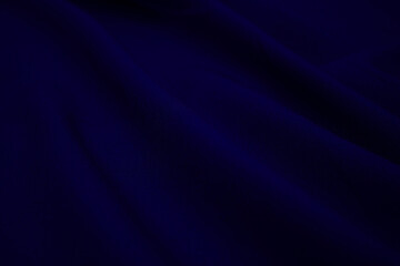 Texture of dark blue fabric closeup. Low key photo. Plexus threads. Clothing industry. Abstract background. Textile waves. - obrazy, fototapety, plakaty