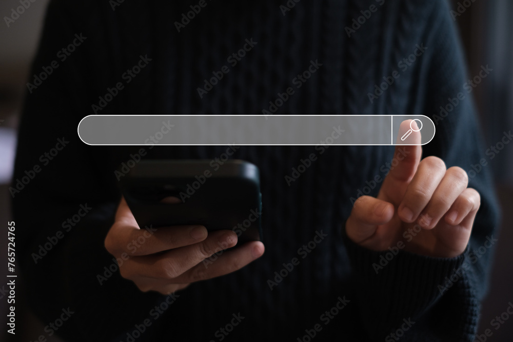 Wall mural woman's hands are finger point to searching for information. using search console with your website.