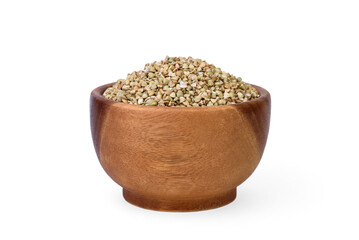 Green buckwheat in wooden bowl isolated on white background.