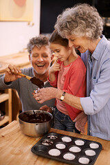 Help, grandparents and baking with girl, home and hobby with happiness and bonding together with recipe. Family, grandchild and senior man with old woman and activity with utensils, food and teaching
