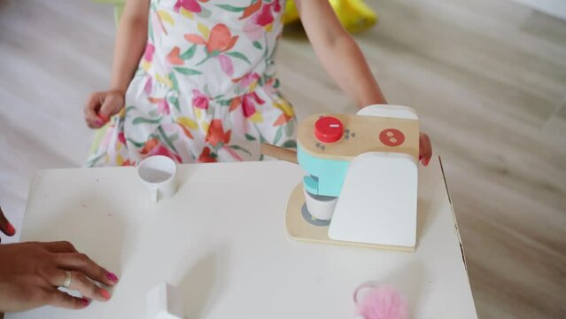 Daughter and father role-playing coffee shop