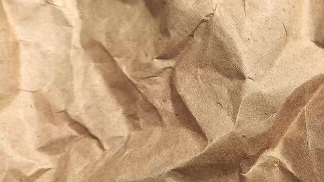 Crumpled paper looping animation. Stop motion animation. Seamless looping.