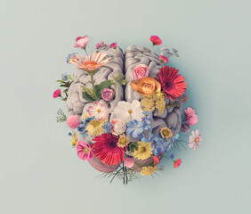 human brain with spring flowers, mental health concept, top view