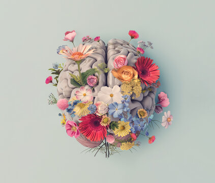 human brain with spring flowers, mental health concept, top view