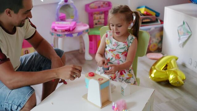 Daughter and father role-playing coffee shop