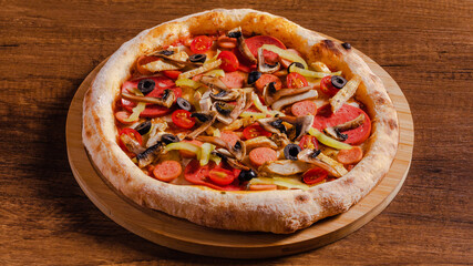 Delicious mushrooms and sausage pizza isolated on wooden background