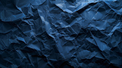 Rough navy blue paper texture. Blue crumpled paper texture and background. Close up view of...