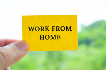 Work from home text on yellow notepad. Work from home concept