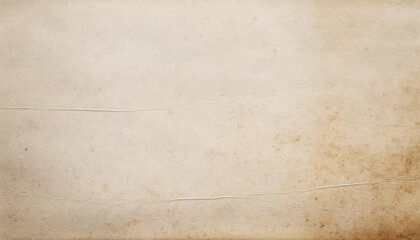 Fototapeta premium Textured, old vintage paper with a warm tone and speckled surface, perfect for backgrounds or overlays.