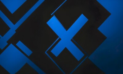a blue x is shown in a black background