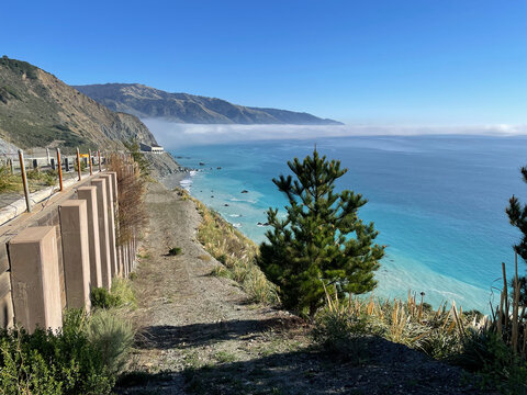 View of California Highway 1 next to Pacific Ocean coast
