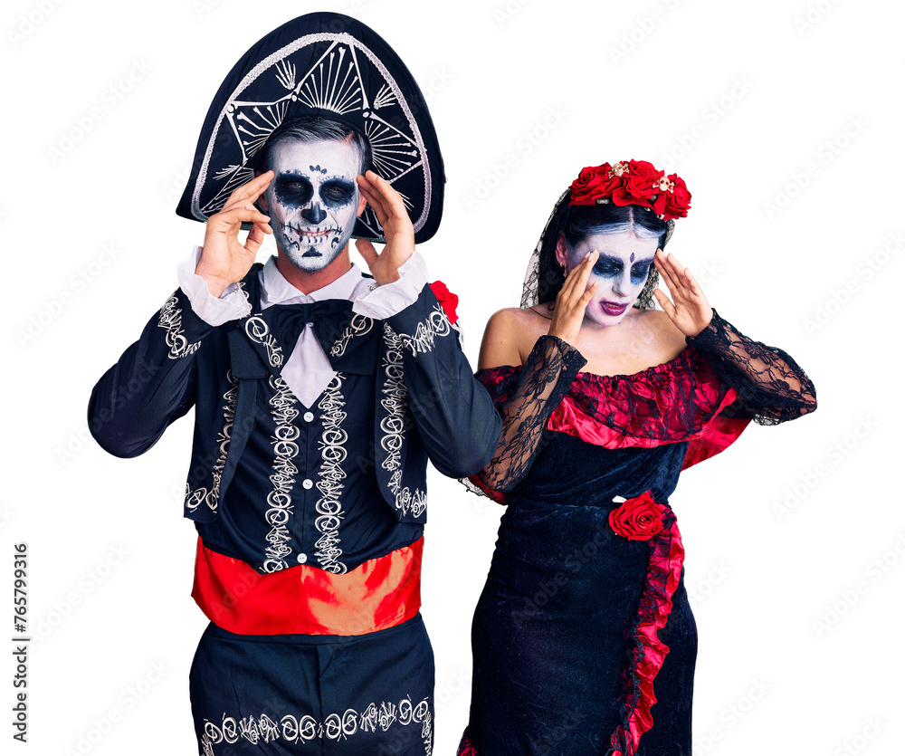 Sticker Young couple wearing mexican day of the dead costume over background with hand on head, headache because stress. suffering migraine.