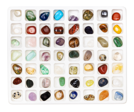 top view on various gemstones for geological collection in open plastic box with cells isolated on white background