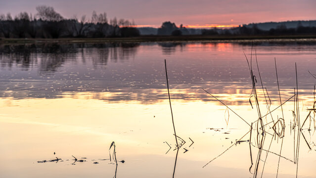 Sunrise over the Supras River at the boulevards in Suprasl.