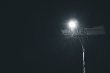 Solar Street Light Pole at night when it rains.