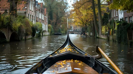Photo sur Aluminium Gondoles A gondola ride through the canals of Amsterdam is a great way to see the city.