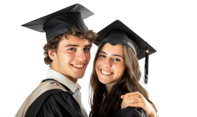 A portrait of the two young beautiful student with graduation hat on the head .