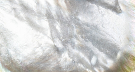 panoramic background made of natural mother-of-pearl surface close up