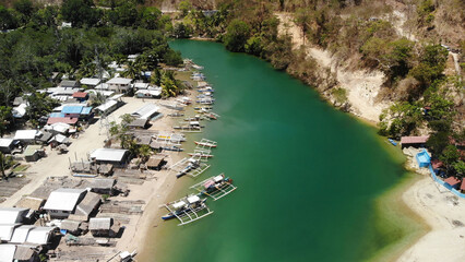Aerial view of the parking lot of wooden motorboats