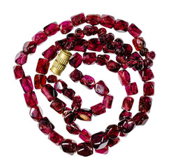 vintage necklace from beads of natural Bohemian pyrope garnets close up isolated on white background